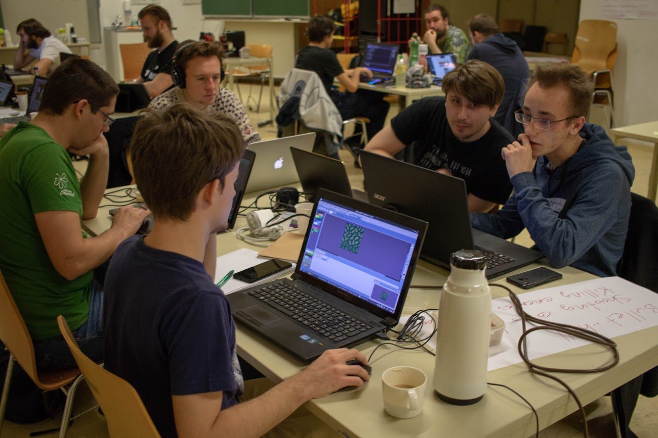 People working hard at their games